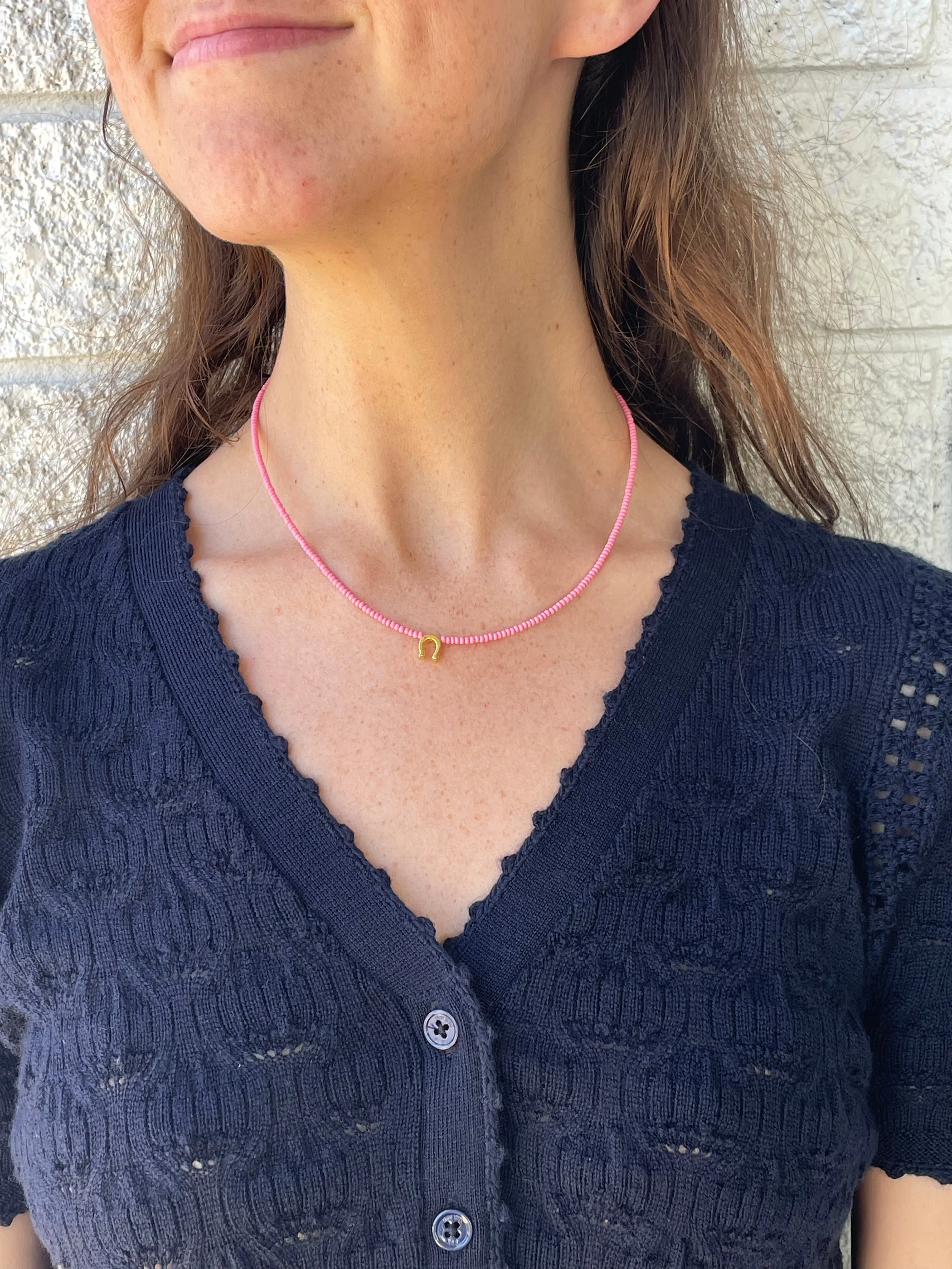 Gold Horseshoe Necklace in Pink